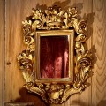 Miroir bois doré sculpté coquilles et rinceaux XVI